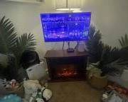 32" TV. Electric Heater, Toys and stuffed animals.