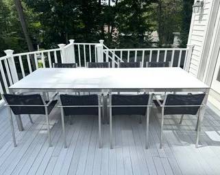 Gloster Kore Contemporary Outdoor Dining Table with 8 mesh Chairs