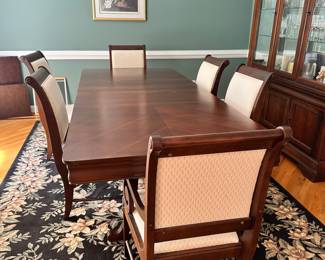 S41 - $350 - Dining Table w/ 6 chairs. This solid wood table is in great condition as it was always covered with a topper. In these photos the leaf is included measuring 100"W x 42"D x 30"T. Without the leaf the table measures 64"W x 42"D x 30"T.