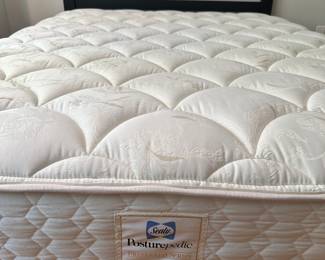 S84 - $200 - Queen Size Metal Bed Frame. Like New Posturepedic Sealy Mattress included if you want it. No stains.