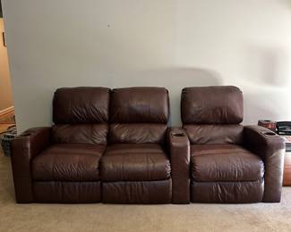S53 - $600 - Lane Furniture. Home Theater Seating for six. Chairs recline and are equipped with cup holders for the ultimate at home movie experience. The leather is in good condition. No signs of damage. From a smoke free home. Still lots of life left in these luxurious pieces! Easily disassembles into 6 different pieces. 104"w x 34"d x 40t. PLEASE HAVE HELP TO MOVED THESE DOWN THE STAIRS.