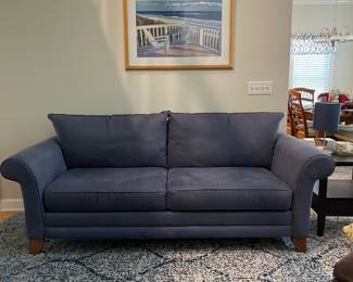 S1 - $300 - Blue 3 Seater Sofa. The brand is Bassett. In good condition. No stains or signs of wear. Smoke free home. 88"w x 37"d x30"t