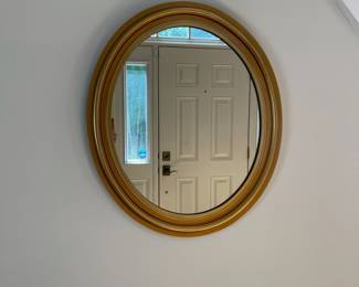 S15 - $45 - Gold Tone Oval Mirror. 22.5" x 26"