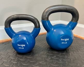 $30 - Pair of Kettlebells. 15lb and 30lb