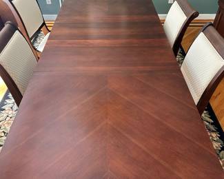 S41 - $350 - Dining Table w/ 6 chairs. This solid wood table is in great condition as it was always covered with a topper. In these photos the leaf is included measuring 100"W x 42"D x 30"T. Without the leaf the table measures 64"W x 42"D x 30"T.