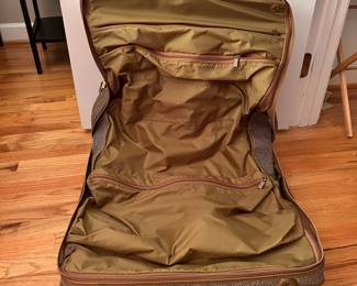 S129 - $40 - Hartmann Tweed Leather Rolling Carry On Luggage Garment Bag Suitcase. Great condition. Some spotting on name tag. See all photos. All mechanics (zippers, wheels, handles) work as they should. 22"w x 19"d x 9"t