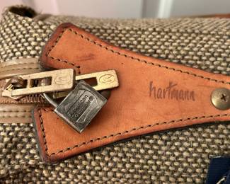 S129 - $40 - Hartmann Tweed Leather Rolling Carry On Luggage Garment Bag Suitcase. Great condition. Some spotting on name tag. See all photos. All mechanics (zippers, wheels, handles) work as they should. 22"w x 19"d x 9"t