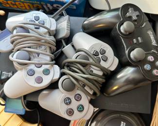 S128 - The controllers that are included with the PS2.