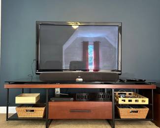 S57 - $40 - Entertainment Center in great condition. No damage or issues. Measures 70"w x 23.5" x 20"T