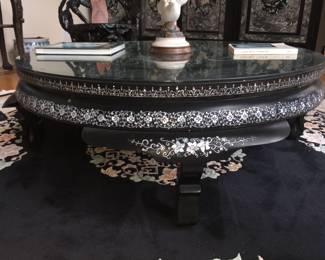 LOT 1: Large Round Asian Mother-of-Pearl Black Lacquer Coffee Table. Comes with removable custom-made glass top to protect design and for functional use.  Table Diameter: 45". Height: 15.5".                       Condition: Very good commensurate with vintage age.