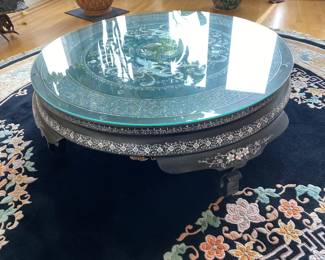 LOT 1: Large Round Asian Mother-of-Pearl Black Lacquer Coffee Table. Comes with removable custom-made glass top to protect design and for functional use.  Table Diameter: 45". Height: 15.5".                       Condition: Very good commensurate with vintage age.