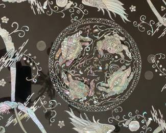 LOT 1: Large Round Asian Mother-of-Pearl Black Lacquer Coffee Table. Comes with removable custom-made glass top to protect design and for functional use.  Table Diameter: 45". Height: 15.5".                       Condition: Very good commensurate with vintage age.
