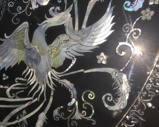 LOT 1: Large Round Asian Mother-of-Pearl Black Lacquer Coffee Table. Comes with removable custom-made glass top to protect design and for functional use.  Table Diameter: 45". Height: 15.5".                       Condition: Very good commensurate with vintage age.
