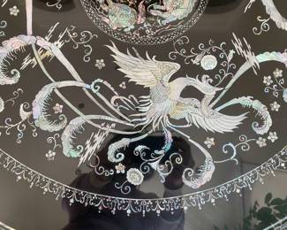 LOT 1: Large Round Asian Mother-of-Pearl Black Lacquer Coffee Table. Comes with removable custom-made glass top to protect design and for functional use.  Table Diameter: 45". Height: 15.5".                       Condition: Very good commensurate with vintage age.