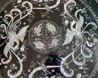 LOT 1: Large Round Asian Mother-of-Pearl Black Lacquer Coffee Table. Comes with removable custom-made glass top to protect design and for functional use.  Table Diameter: 45". Height: 15.5".                       Condition: Very good commensurate with vintage age.