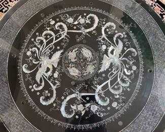 LOT 1: Large Round Asian Mother-of-Pearl Black Lacquer Coffee Table. Comes with removable custom-made glass top to protect design and for functional use.  Table Diameter: 45". Height: 15.5".                       Condition: Very good commensurate with vintage age.
