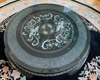 LOT 1: Large Round Asian Mother-of-Pearl Black Lacquer Coffee Table. Comes with removable custom-made glass top to protect design and for functional use.  Table Diameter: 45". Height: 15.5".                       Condition: Very good commensurate with vintage age.