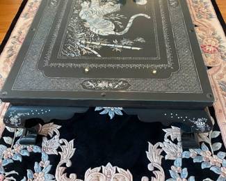 LOT 2: Large Rectangular Asian Mother-of-Pearl Black Lacquer Coffee Table. Comes with removable custom-made glass top to protect design and for functional use. Table Measurements: Width: 61.5". Depth: 35". Height: 14.5".  Condition: Very good commensurate with vintage age. 
