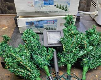 (2) Sets Of 4 Solar Lighted Tree Stakes
