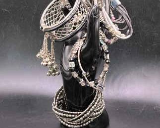(8) Silver Tone Bracelets & Bangles featuring Monet
