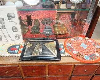 Embroideries, copper and brass desk pieces and ashtrays