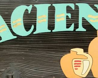 Hacienda Antiques wood sign