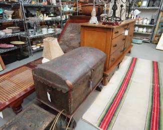Antique tooled leather Spanish domed trunk, Monterey sideboard, Early American Campaign bed