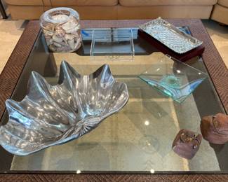 The pewter shell dish and the canister with the shells were sold.