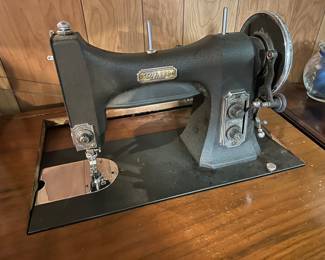 White sewing machine and cabinet......