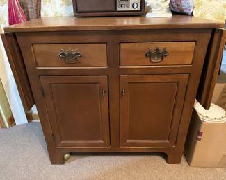 Server cabinet with drop leaves