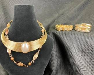 Goldtone Necklace and Bracelet Assortment Featuring Faux Pearl