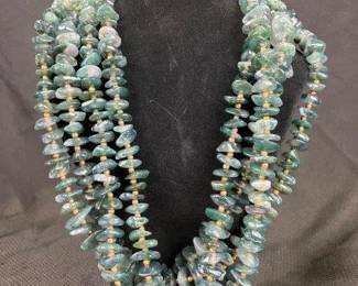 Group of Four Green Kyanite and Gold Tone Bead Necklaces