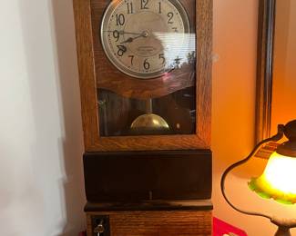 Antique time clock in perfect condition