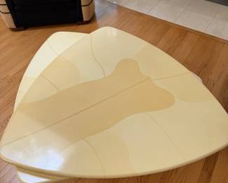 Rare guitar pick shaped articulating coffee table.