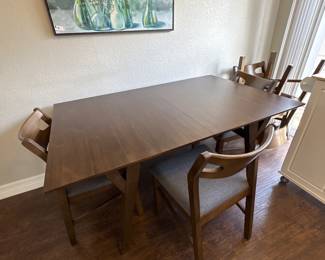 60 inch table with a 20 inch leaf in six chairs