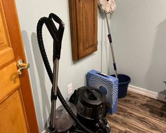Vacuums. Mop.