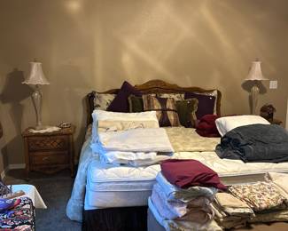 Stanley furniture king headboard. Lamps. Stanley furniture nightstands. Full and king Bedding.