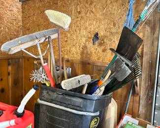Rakes. Brooms shovels.