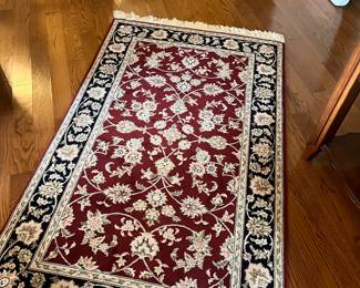 Ahmadys persian rugs.
