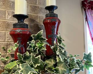 Candles. Candle holders. Greenery.