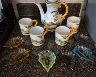 A couple of the glass dishes lit up under the black light! Grazia Deruta Italian Pottery.