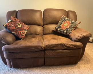 Love seat with both sides reclining.