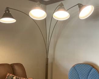 Unique 4-pronged floor lamp.