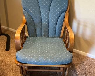 Glider rocking chair.