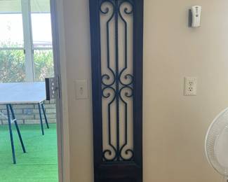 Wood and wrought iron wall panels (2).