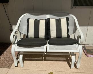 Metal glider loveseat.