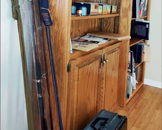 Old Fishing Rods, Reels, Booklets, and a Tackle Box