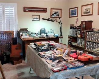 The room that holds most of the model shipbuliding supplies and tools. There are also framed photos of military ships, and salvaged items.
