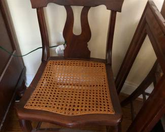 Set of 8 antique carved wood chairs with excellent caned seats 