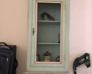 Country French curio cabinet with wire front